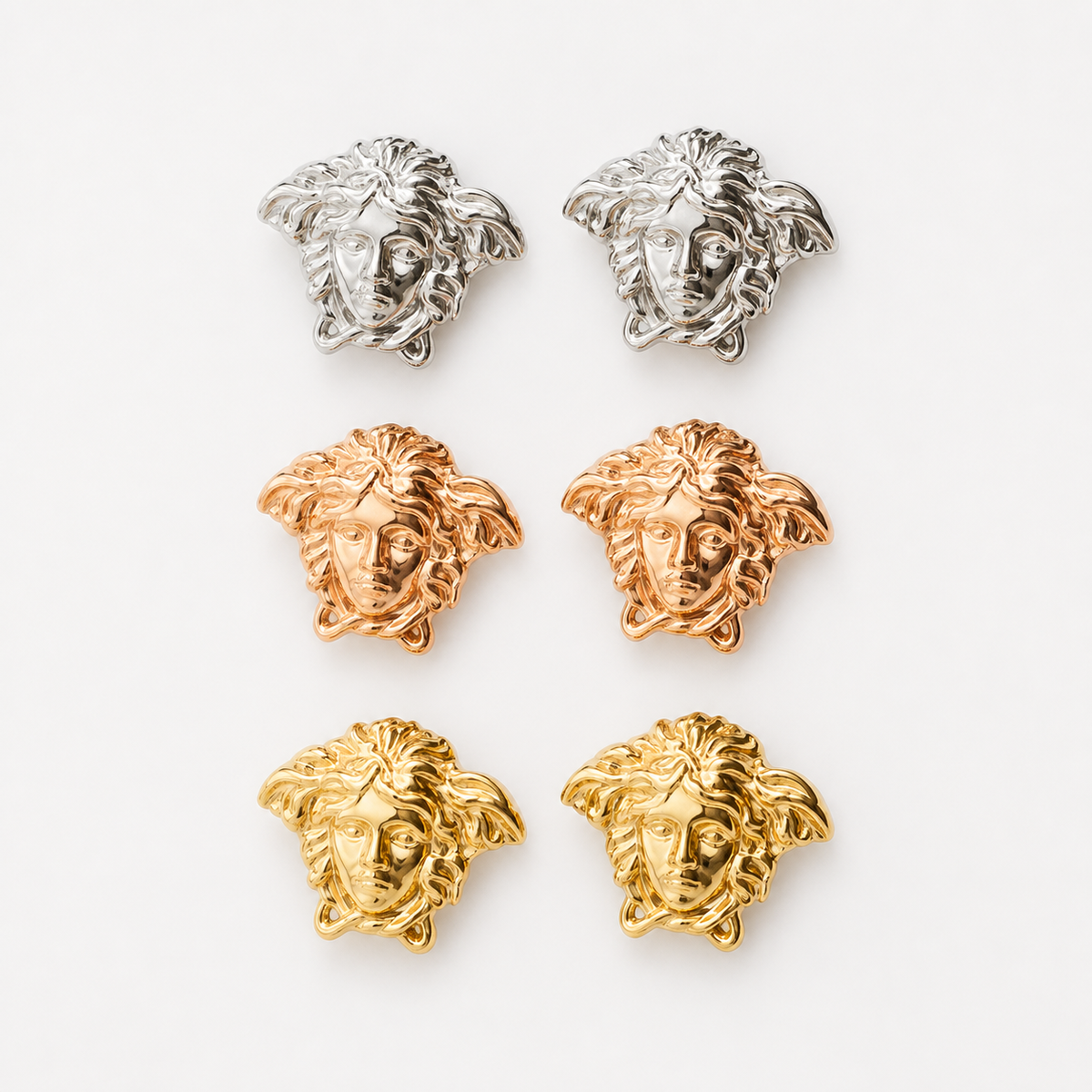 Professional studio product photo of 9ct Gold Mythology Medusa Cut-out Earrings on white background