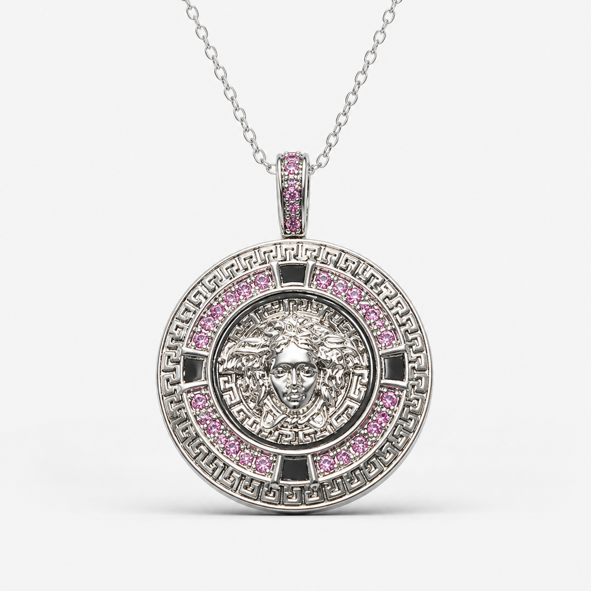 Professional studio product photo of Greek Key Mythology Medusa Pendant Pink CZ Stones + Sterling Silver Chain on white background