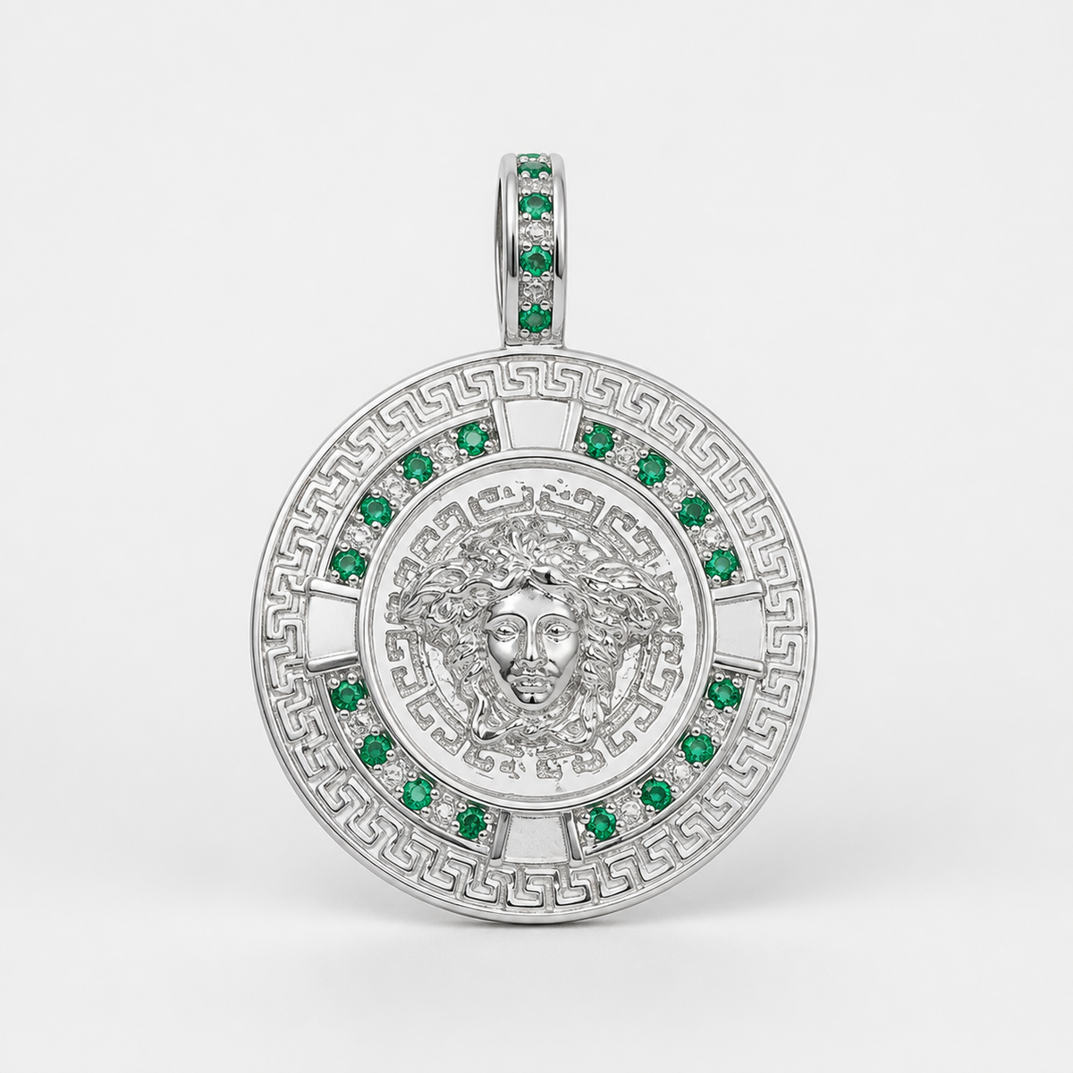 Professional studio product photo of Greek Key Mythology Medusa Big Pendant Green CZ Stones + Sterling Silver Chain on white background