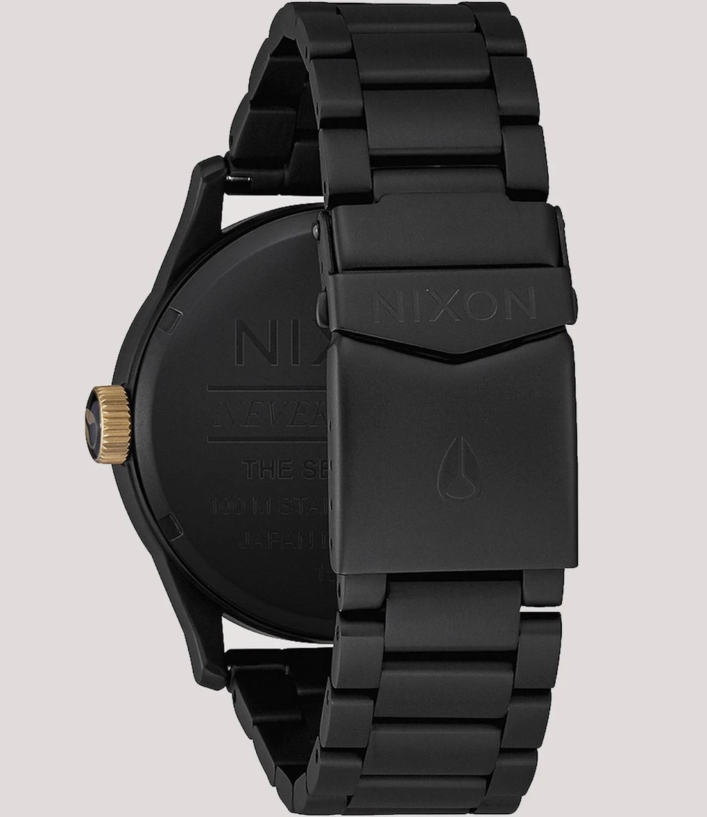 Nixon Sentry matte black gold watch detail