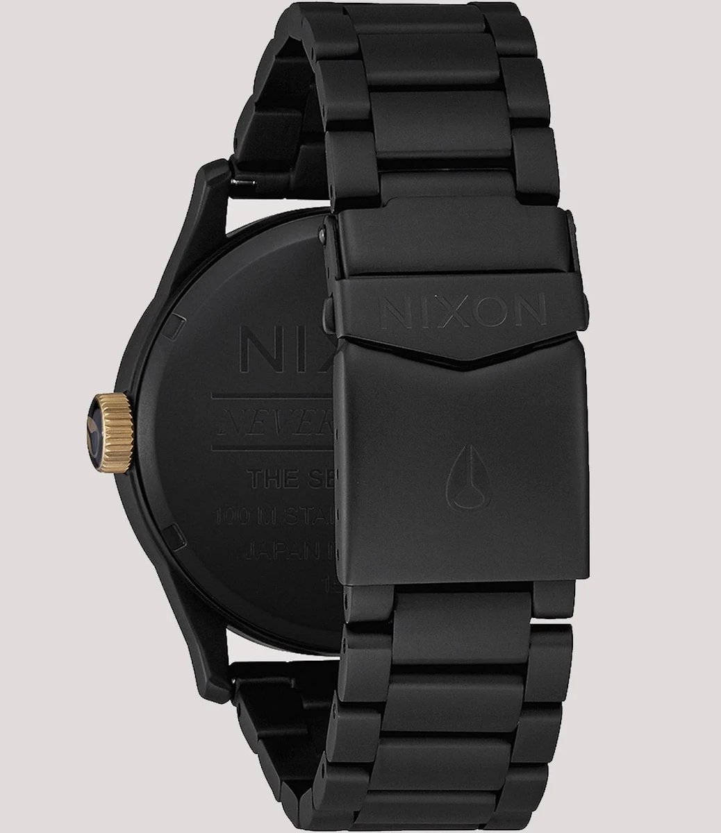 Nixon Sentry matte black gold watch detail